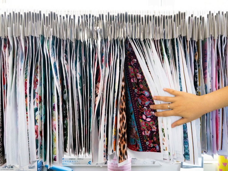 Swimwear patters at a showroom in Xingcheng, China, on July 10, 2020. When the pandemic shut down pools and resorts around the globe, life slid to a halt in the seaside town of Xingcheng, a major producer of bikinis and trunks. (Giulia Marchi/The New York Times)