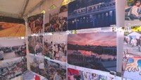 歴史や西日本豪雨からの復興を伝える 河川敷の京橋朝市で写真展 岡山市