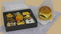 土庄町の食材を使ったメニュー「ごっつうまげ弁当」と「島ハモフィレオバーガー」