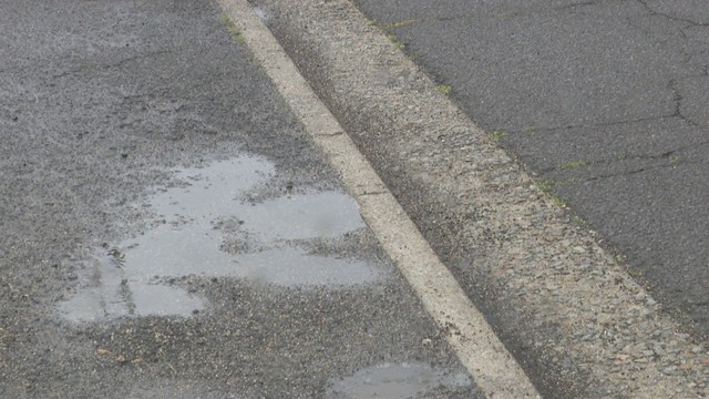 女性が倒れていた駐車場　坂出市旭町