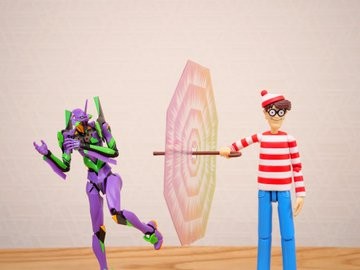 エヴァンゲリオンのATフィールドをやすやすと破るウォーリーさん（提供画像）