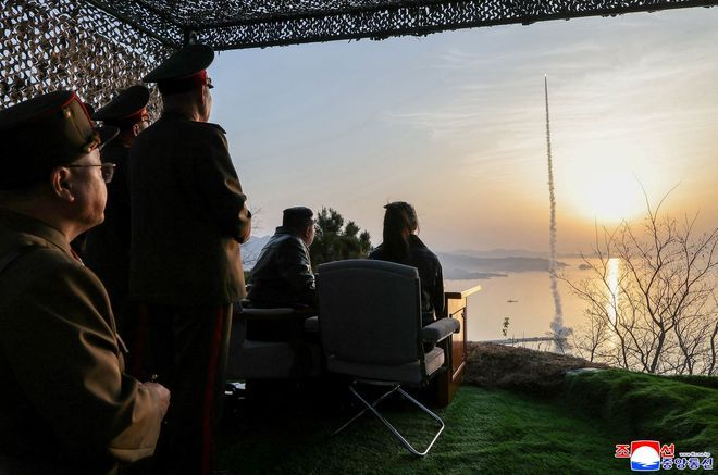 N. Korean leader Kim oversaw test of missiles with cluster warheads