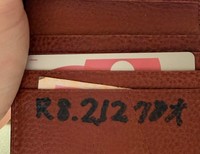 もらった日付と年齢が書かれたソメスサドルの財布／投稿主さん提供＝画像をトリミングしています