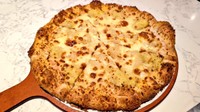 中国で人気のドリアンピザ。「濃厚なチーズとの相性が最高で、口の中で芳醇な甘さと旨味が溢れ出します！」／Lillianさん（@Lily0727K）提供