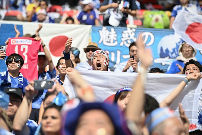 Japan's World Cup fans cleaned up the stadium after they won. Now others  are doing it. - Vox