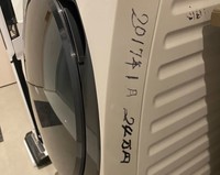 洗濯機に書かれた日付。祖父の“記入習慣”は家電にも及んでいる／yamaさん（＠yamarin_home03）提供