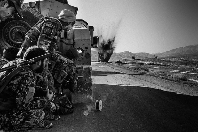 GHAZNI, AFGHANISTAN - DECEMBER 2:A demining team of the Afghan national army detonate an Improvised explosive device that have been found on the Ghazni-Kandahar highway.A team from camp Sultan search this road for IEDs on a daily basis and often found one or many that have been set up by the Talibans the night before.Improvised explosive devices are one to the leading cause of casualties among civilians and members of the Afghan security forces. (Photo by Lorenzo Tugnoli/ The Washington Post)