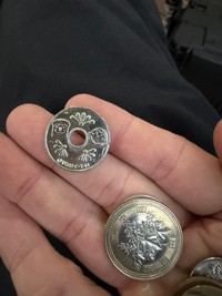 50円玉かとおもいきや…（佑さん提供）