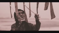 土取利行さんの映像作品「浜辺のサヌカイト」より