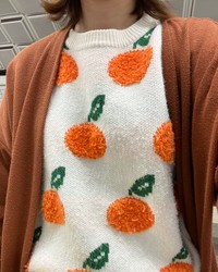 「オレンジの人呼ばわり」されたセーター。
