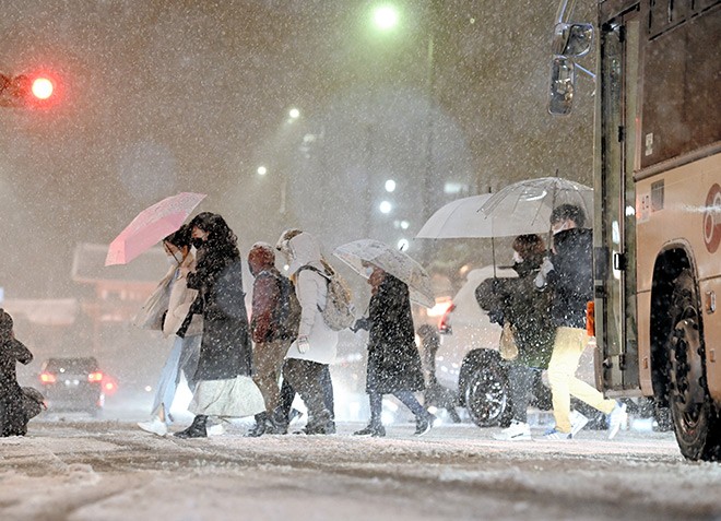 Snowstorm in Tokyo disrupts road, rail and air transport