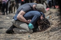 Relatives react at the scene where the Ethiopian Airlines Boeing 737 Max 8 crashed shortly after takeoff on Sunday killing all 157 on board, near Bishoftu, south of Addis Ababa, in Ethiopia Wednesday, March 13, 2019. The black box from the Boeing jet that crashed will be sent overseas for analysis but no country has been chosen yet, an Ethiopian Airlines spokesman said Wednesday, as much of the world grounded or barred the plane model and grieving families arrived at the disaster site.
