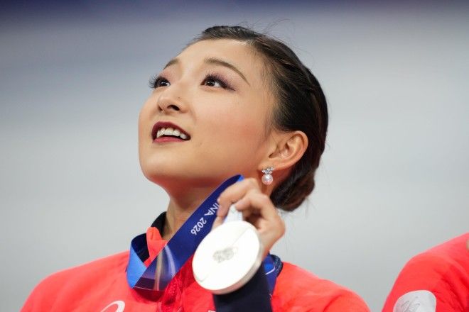 OLYMPICS/ Japan's figure skating team silver felt like gold, says