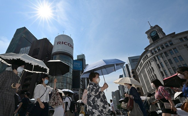 Cities near Tokyo mark 'summer' weather with record high