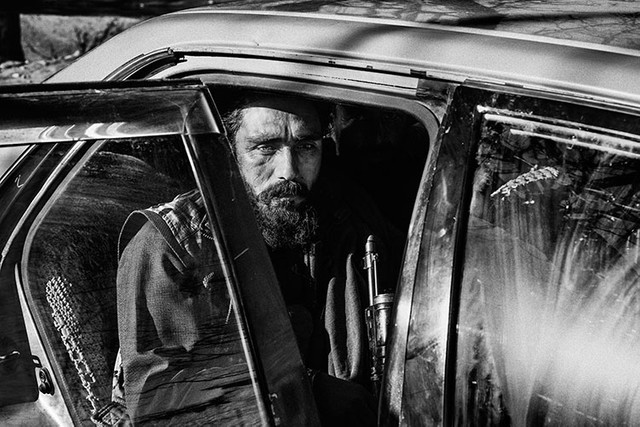 NANGARHAR PROVINCE, AFGHANISTAN - DECEMBER 11:A group of Taliban fighters group in the morning in Khogiani district. (Photo by Lorenzo Tugnoli/ The Washington Post)