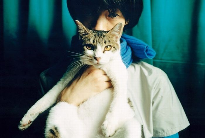 ＣＤジャケットになったポチとの写真（山田さん提供）