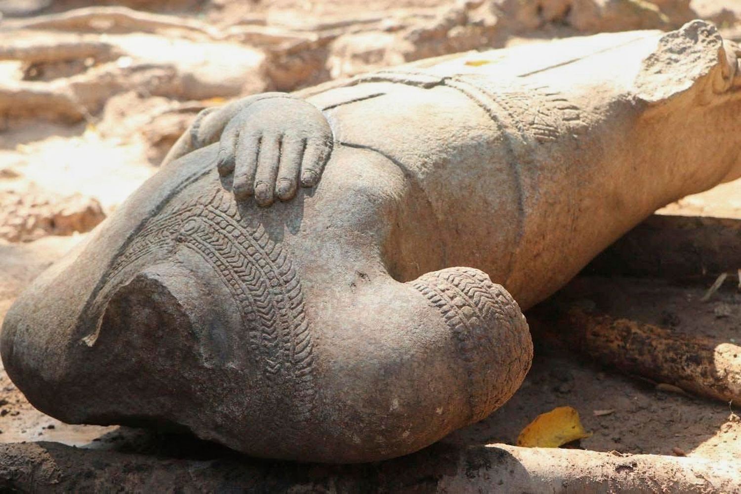 The torso of a Buddha statue has been found at Cambodia’s Angkor temple ...