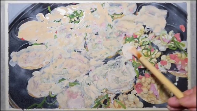 筆で丁寧に生地を流していきます。 ※山田めしがさんのX動画より抜粋