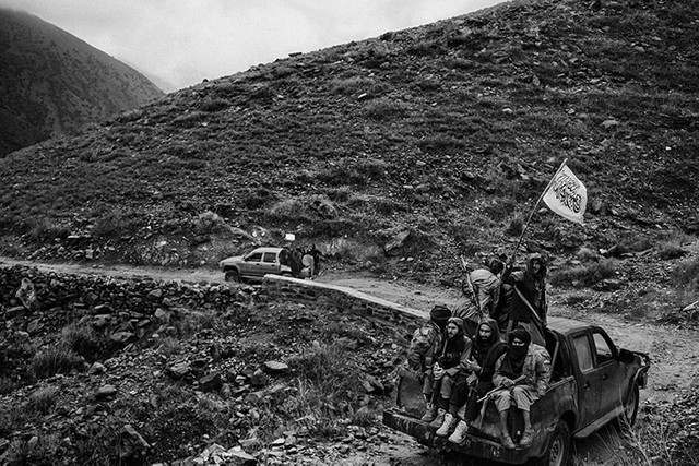 NANGARHAR PROVINCE, AFGHANISTAN - DECEMBER 11:Taliban fighters drive on a road of Khogiani district and display their flag. The area was previously control by the Islamic State then retook by the Talibans.(Photo by Lorenzo Tugnoli/ The Washington Post)
