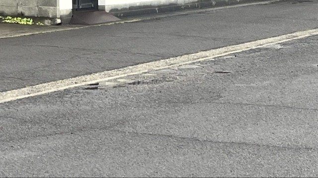 女性が倒れていた駐車場　坂出市旭町