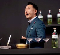大会でプレゼン中の長尾さん