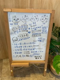 ハンバーガー屋さんの看板。よく見ると「吸猫」の文字が（撮影：Coco）