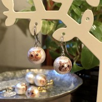 オリジナルピアス（ウニペコ）/人気猫、ウニちゃんとぺコラちゃんの顔写真がプリントされたアクセサリーです。こちらも萬野さん制作。