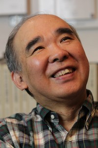 笑顔を見せる田中芳樹さん