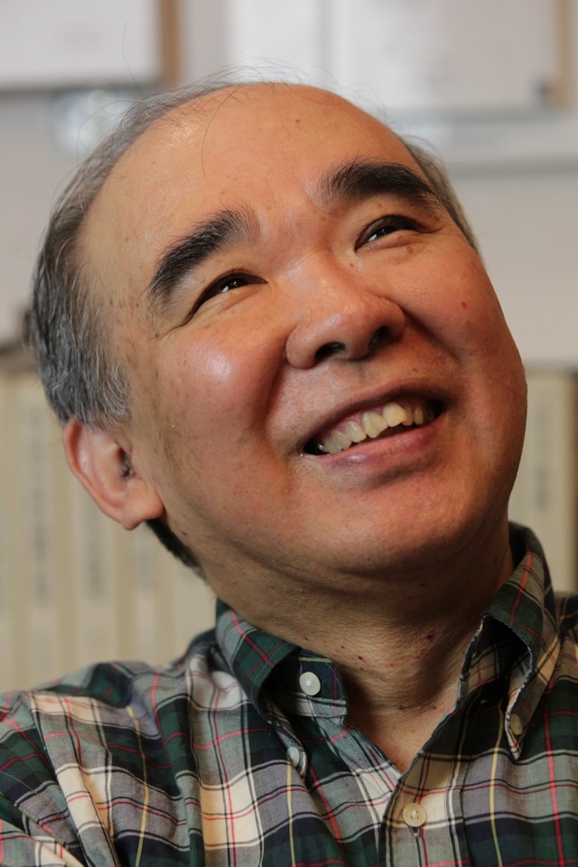 笑顔を見せる田中芳樹さん