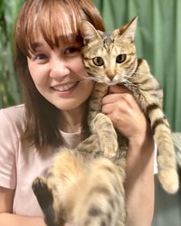 佐々木さんとみかんちゃん。大切な家族