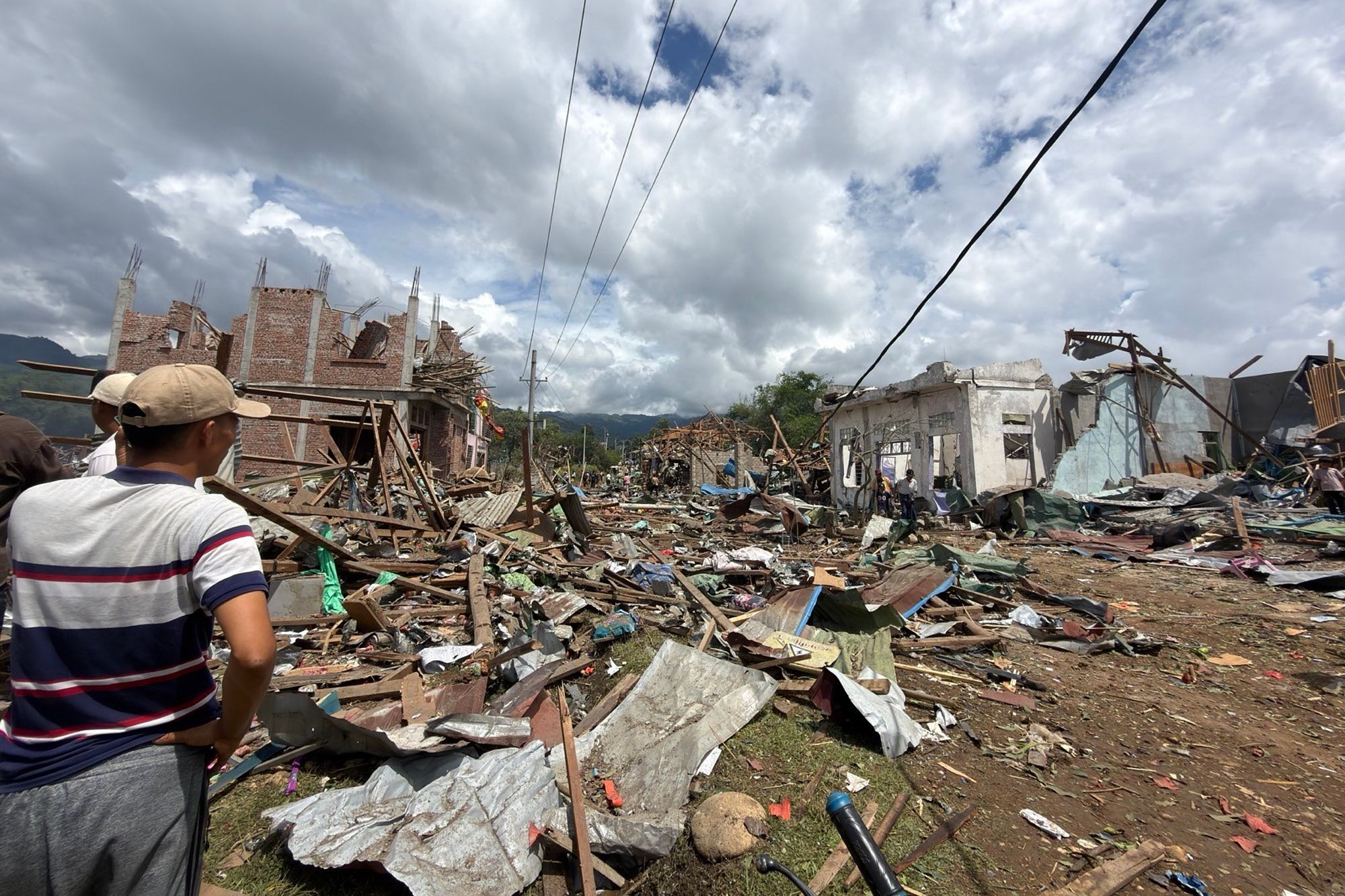 Rescuers dig for bodies after a mining explosives blast in Myanmar kills ...
