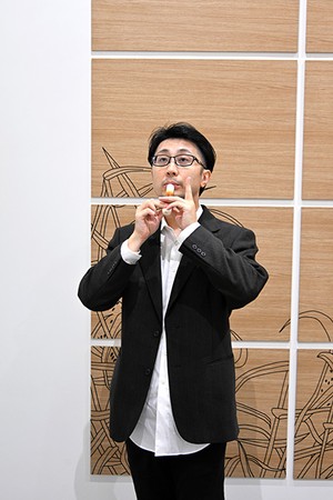 Whimsical flutist strikes chord with fish cake performances | The