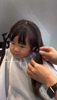 ヘアドネーションをするため、カット前に髪を結ぶ／糒義徳さん（@hmj_fuk_hoshii_short）提供