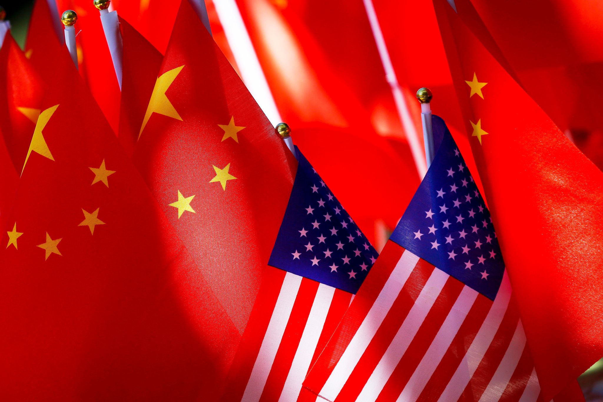 China blasts U.S. for its computer chip moves and for threatening student visas