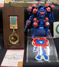 ミャクミャクカラーコンペ優勝の証のメダル！（提供：がんばすさんさん）