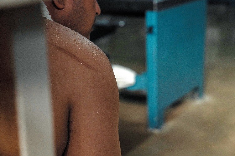 A “cooling towel" wrapped around the neck of an inmate perspiring inside Lopez State Jail, a facility that lacks air conditioning, in Edinburg, Texas, Aug. 19, 2022. Texas is having its second-hottest summer on record, yet most state prisons and jails have no air conditioning. (Verónica G. Cárdenas/The New York Times)