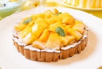 おすすめスイーツベスト2の「マンゴーベビースタータルト」（おやつタウン提供）