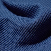 洗い加工を施したワッフル素材を使用。ふっくらとした、やわらかな着心地。（提供写真）