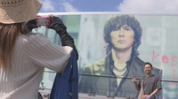 記念撮影するファン