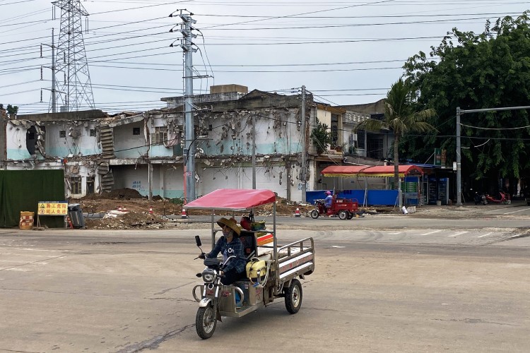 A street on Hainan Island on China's southern coast, October 2020. Hainan Province is building a large, tariff-exempt industrial zone on its western coast, and has bulldozed homes to put in wide avenues and power lines for new factories. (Keith Bradsher/The New York Tims)