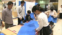 西日本豪雨で使われたブルーシートを再利用　小物作りのワークショップ　倉敷市