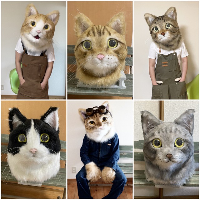 これまでの猫のかぶりもの（頭）作品の一部と、自らの作品を着用してポーズをとるネコかぶってますがさん。（ネコかぶってますがさん提供）