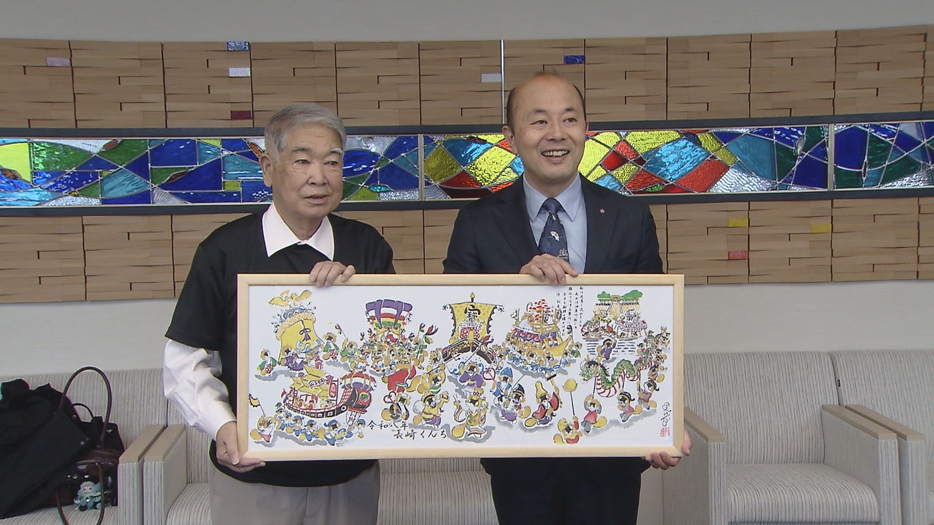 長崎くんちを「たぬき絵」で表現した手ぬぐいお披露目 来月発売 | 長崎