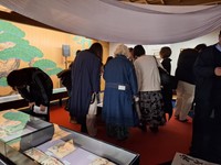 女性の来場者が目立つ春画展の会場。能舞台に数々の作品が展示された＝東京・新宿歌舞伎町