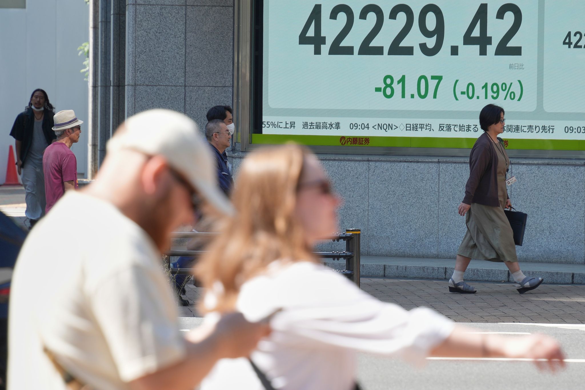 Asian benchmarks slip after U.S. stocks sink and Japan faces political uncertainty
